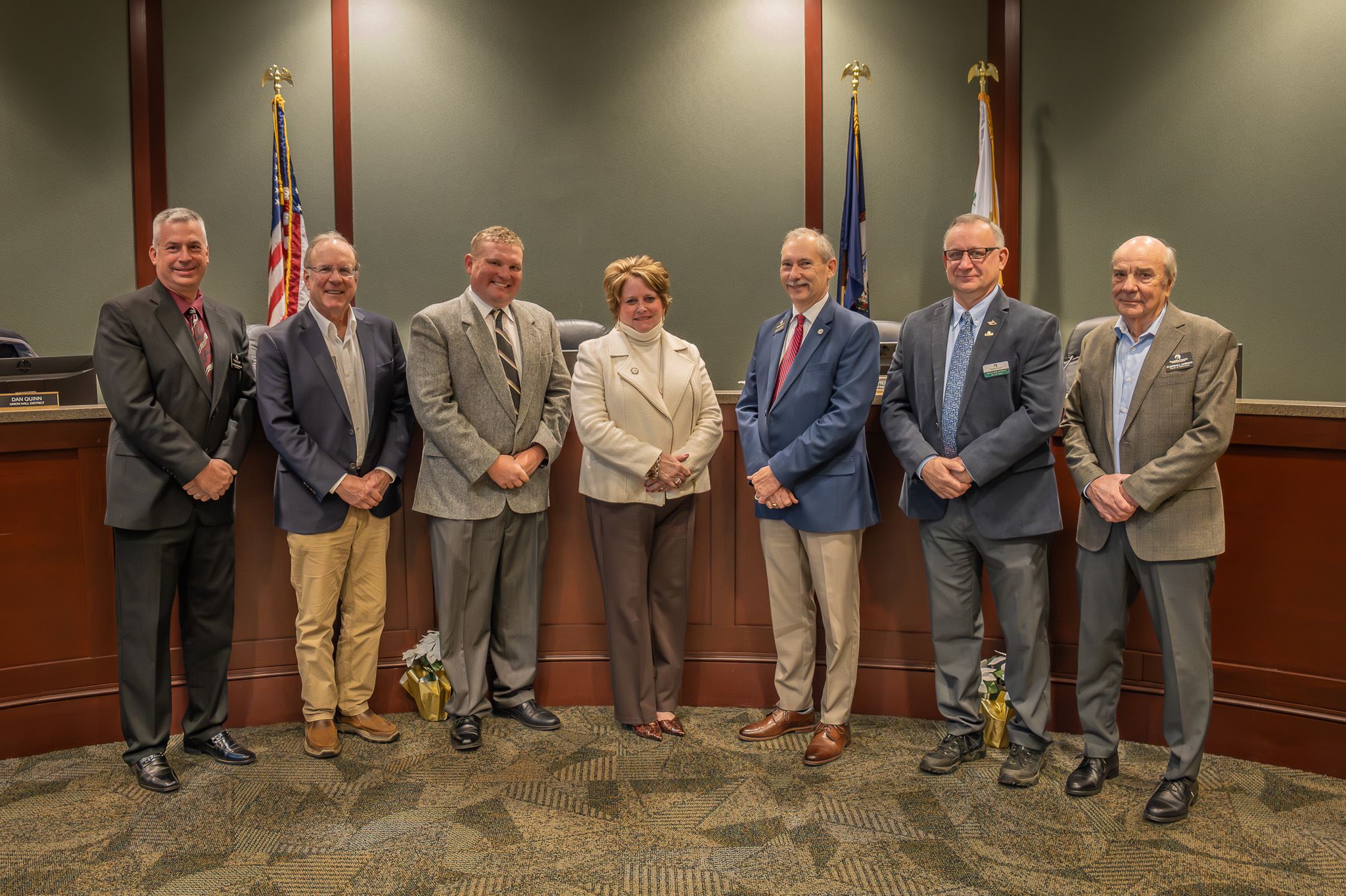 A Group photo of the Franklin County Board of Supervisors Members in front of the dias.